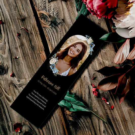 Personalised memorial bookmarks with elegant floral designs, part of Loving Whisper's collection to honour and remember loved ones.