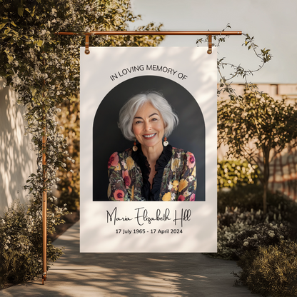 Memorial Welcome Sign with a photo framed in an elegant arch, featuring "In Loving Memory" above, a name in a delicate handwritten font, and birth and death dates at the bottom.