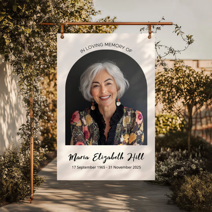 Memorial Welcome Sign with a photo framed in an elegant arch, featuring "In Loving Memory" above, a name in a delicate handwritten font, and birth and death dates at the bottom.